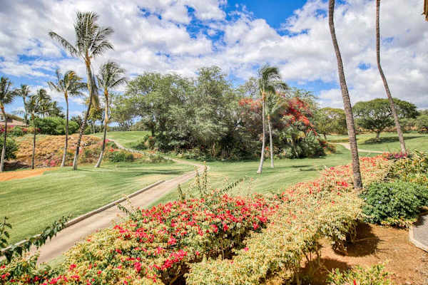 Colorful tropical gardens create a peaceful resort setting