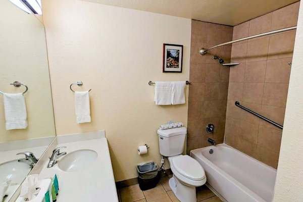Full bathroom with a bathtub for a relaxing soak
