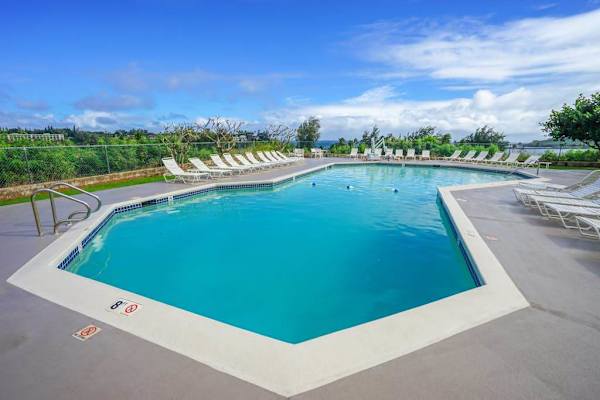 Relax by the expansive pool with tropical surroundings
