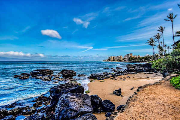 Hidden Beach Framed By Volcanic Rocks