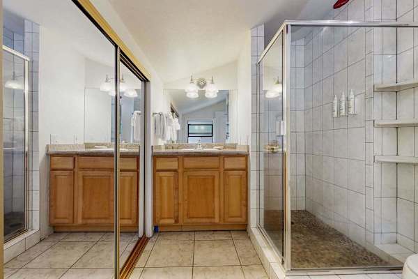 Guest room with walk-in shower.
