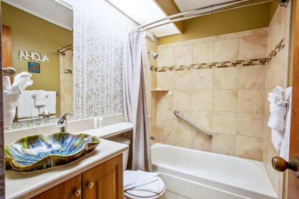 Primary bathroom with tub/shower combo.