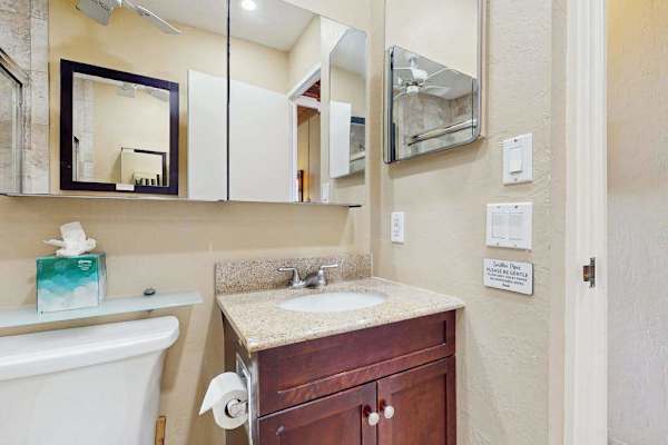 Master bathroom with large walk-in tiled shower.