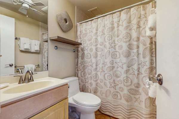 Charming Full Bathroom With Coastal Flair