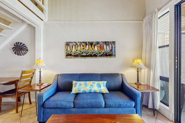 Living area with sleeper sofa and lanai access