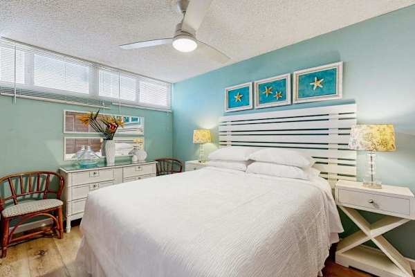 Primary Suite with queen bed and en suite bathroom.
