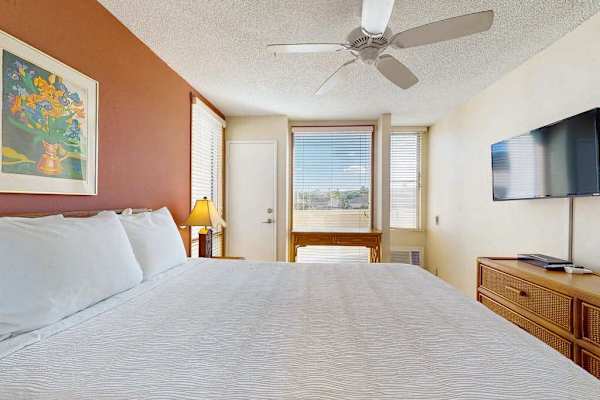 Bright Guest Bedroom With Smart TV