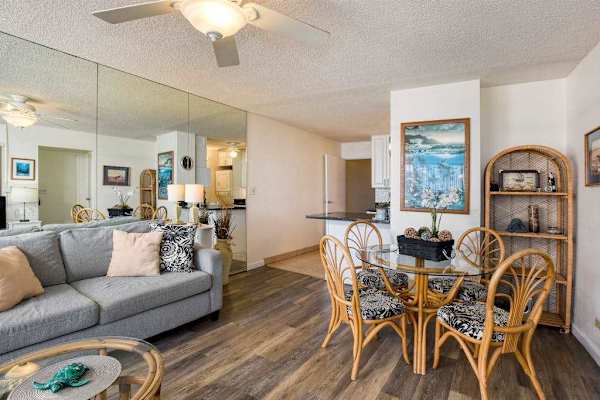 Dining room with seating for four, enjoy a great family dinner from the comfort of your condo.
