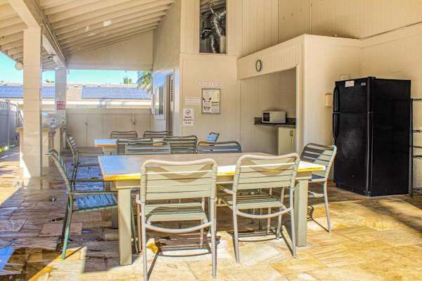 Take advantage of the community BBQ area with grills, picnic tables, chairs, and an outdoor refrigerator—perfect for enjoying meals in the Hawaiian sunshine.