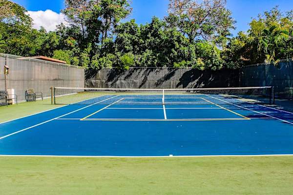 Enjoy a friendly match on Kihei Akahi's well-maintained tennis courts, surrounded by lush tropical landscaping and beautiful island sunshine.
