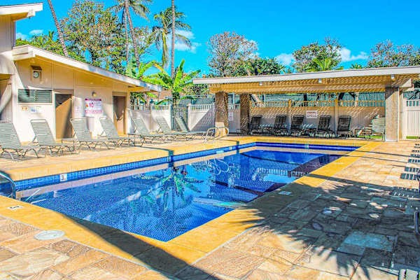 Resort Pool Surrounded By Palm Trees