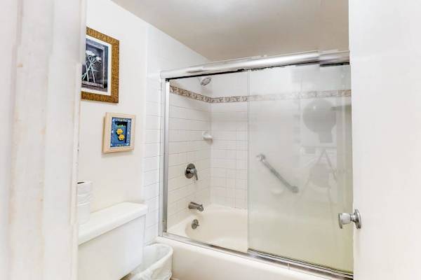 Refresh and unwind in the full bathroom featuring a relaxing bathtub and shower