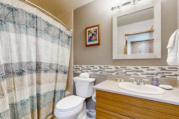 Full Bathroom with Vanity, Toilet, and Shower-Tub Combo