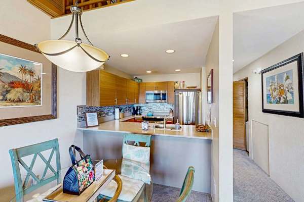 Cozy Dining Nook adjacent to Open Kitchen with Breakfast Bar