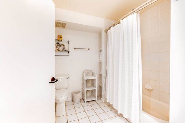 Bright Bathroom With Tub And Shower