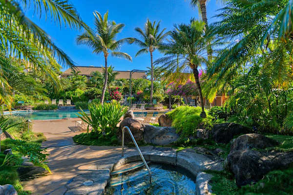 Tropical garden setting surrounds the spa with lush island greenery