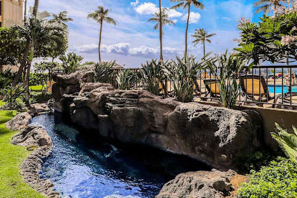 Tranquil resort garden with lava rock features