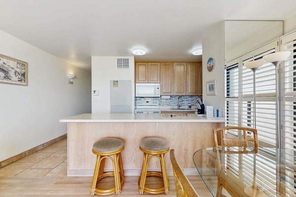 Barstools at the kitchen for extra seating. 