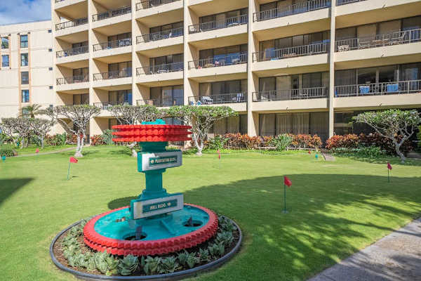 Charming Island Fountain Set In Lush Resort Grounds