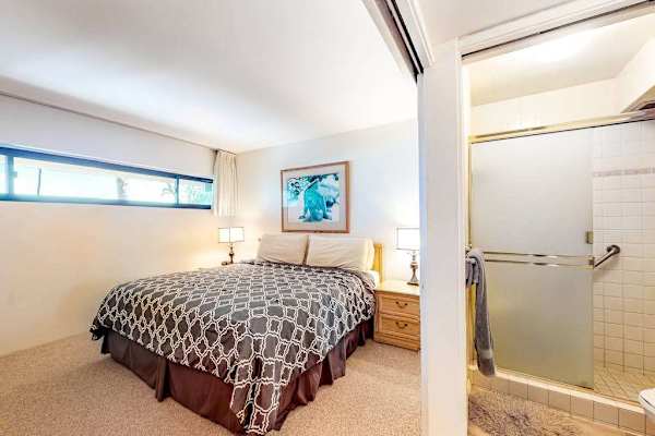 Bed room offering a king size bed and private bathroom 