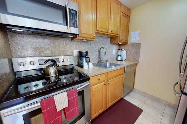 Gourmet Kitchen Setup Complete With Modern Stainless Appliances