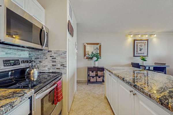Fully updated kitchen with stainless steel appliances.