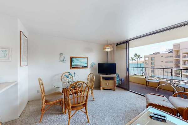 Dining area with views of the resort and ocean beyond