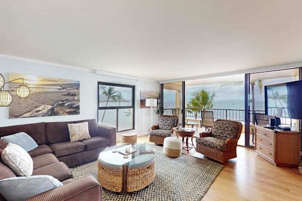 Bright living room with comfortable seating and sofa bed