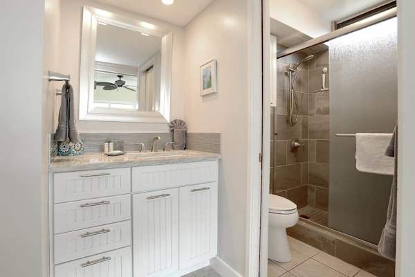Newly remolded condo with walk in tiled shower.