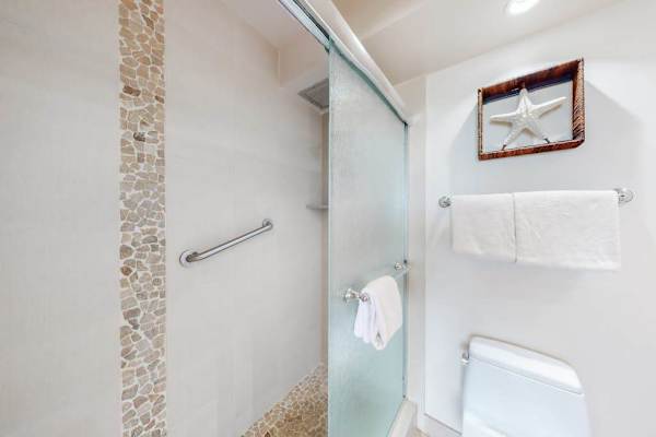 Enjoy a refreshing shower after time by the ocean