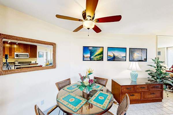 Dining Table Set for Four with Tropical Wall Art