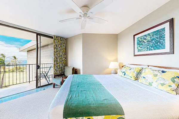Bright Primary Bedroom with King Bed & Private Balcony Access