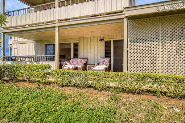 Exterior View of Ground-Floor Private Patio and Condo Building