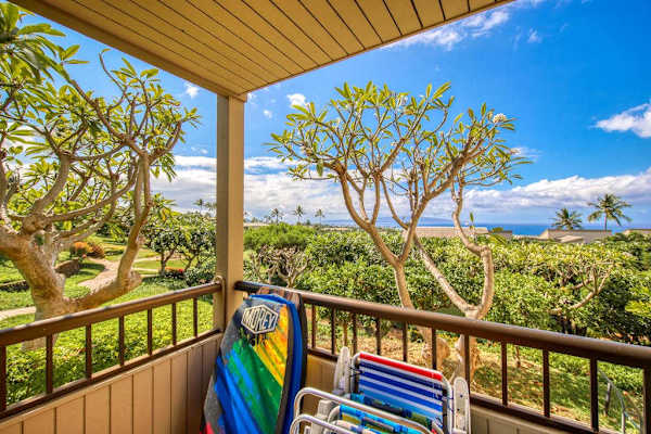 Balcony View with Beach Gear and Tropical Garden Surroundings