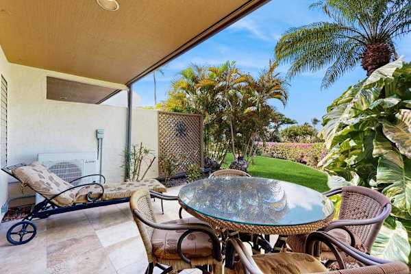 Lanai surrounded by tropical greenery