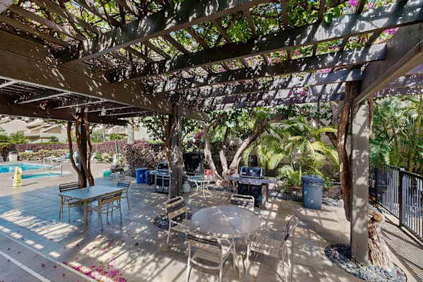 Shaded poolside patio for outdoor gatherings
