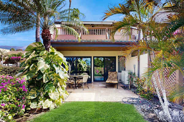 Step outside to lush tropical gardens
