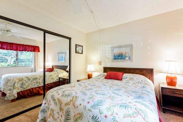 Bedroom With Wall-To-Wall Mirrors