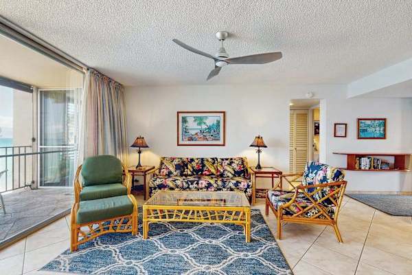 Gather in the comfortable living room with plenty of natural light and island-inspired décor.
