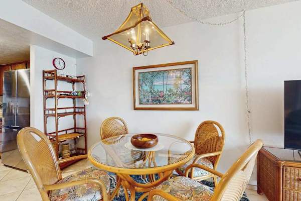 The cozy dining area is perfect for sharing breakfast, lunch, or dinner together.