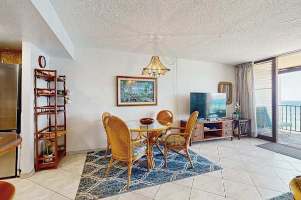 Enjoy meals together in the bright dining area with an open layout connecting to the living space.