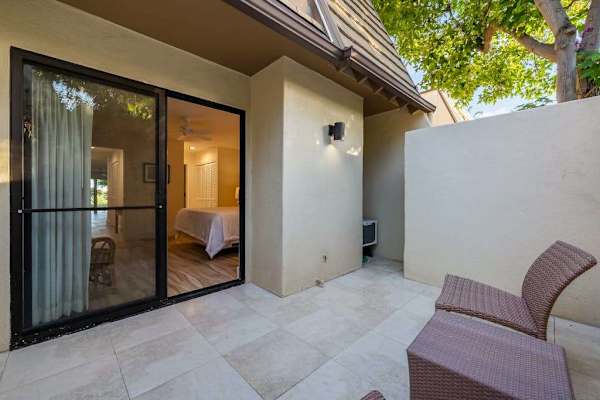 Open lanai delivers fresh air and peaceful tropical views daily