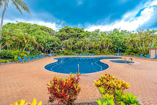 Sparkling resort pool creates a relaxing tropical setting for guests