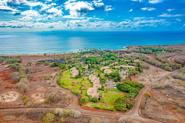 Nearby island coastline pairs blue Pacific waters with open landscapes