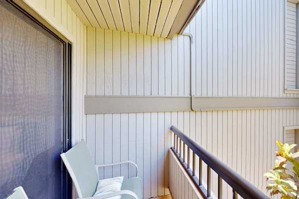 Private Covered Balcony Nook with Outdoor Lounge Seating
