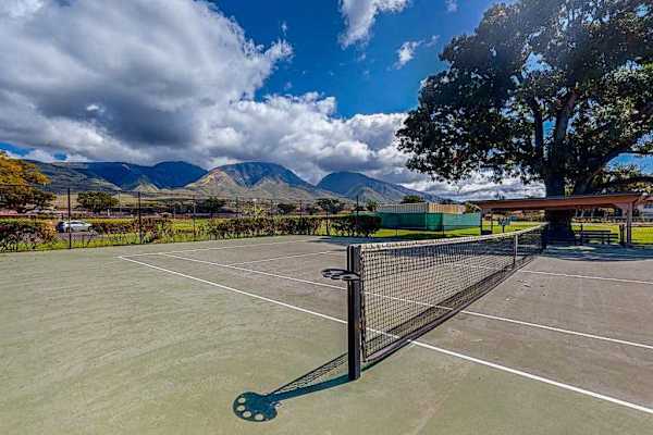 Enjoy a game of tennis while taking in beautiful mountain views.