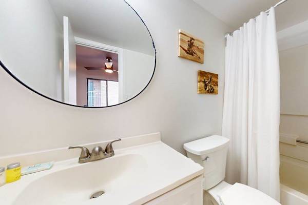 Clean Bathroom With Tub And Shower