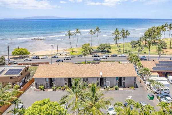 Aerial view of the oceanfront property and parking area