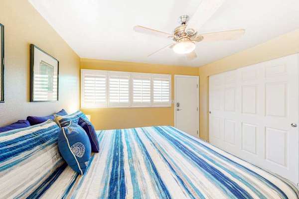 Enjoy spectacular sunrises over Haleakalā volcano from the window of this guest bedroom 