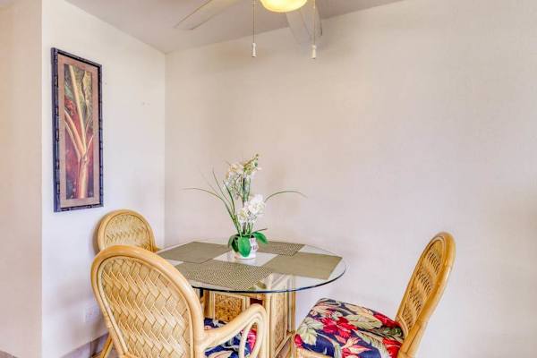 Enjoy meals together in the bright dining area with comfortable seating for four guests.